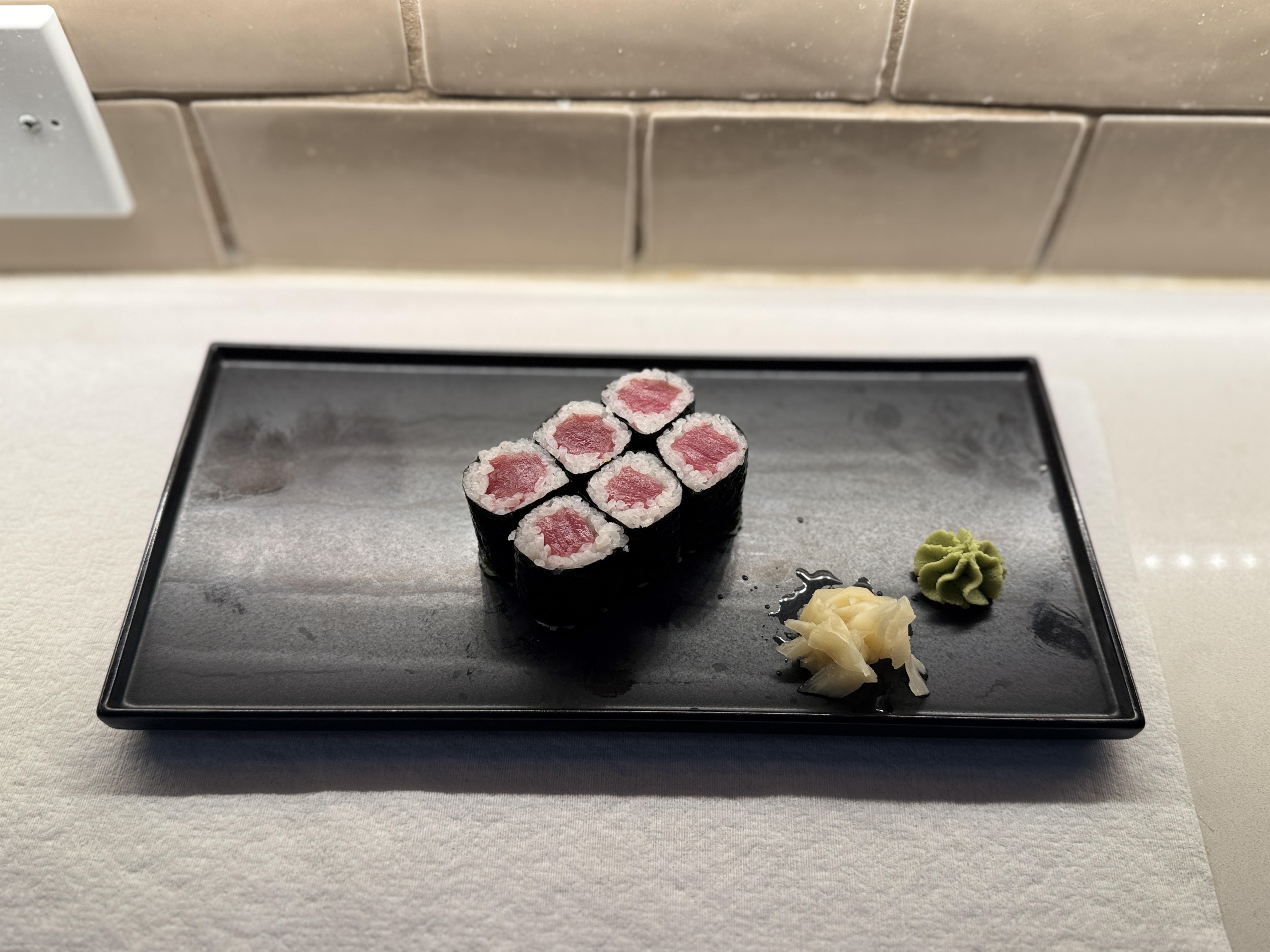 Fresh tuna roll prepared with seasoned sushi rice
